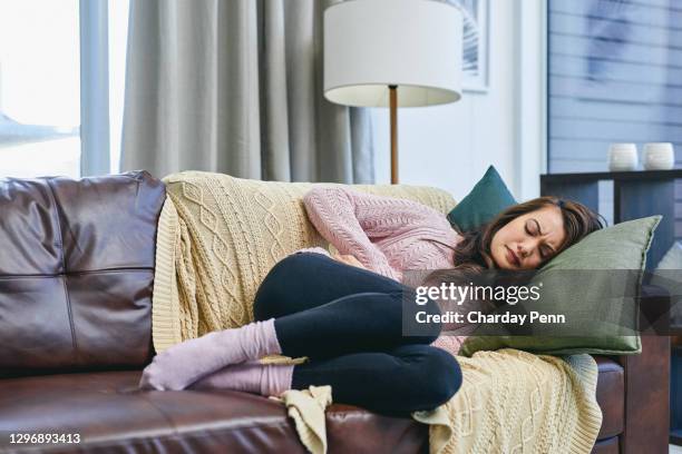 it's my least favourite time of the month - period pain stock pictures, royalty-free photos & images