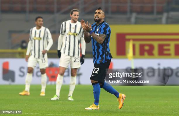 Arturo Vidal of Inter Milan celebrates after scoring their sides first goal during the Serie A match between FC Internazionale and Juventus at Stadio...