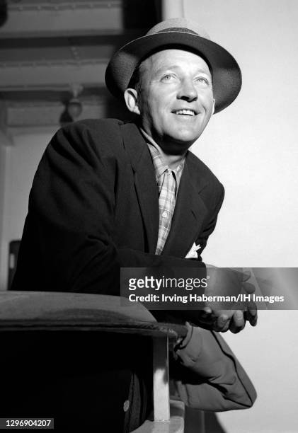 American singer, comedian and actor Bing Crosby poses for a portrait on the RMS Queen Elizabeth while arriving from Europe on June 14, 1950 in New...