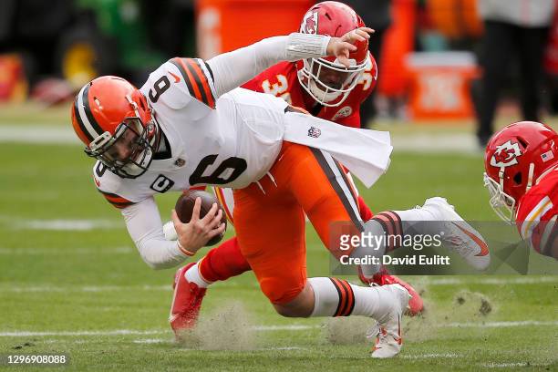 Quarterback Baker Mayfield of the Cleveland Browns is sacked by cornerback L'Jarius Sneed of the Kansas City Chiefs during the first quarter of the...