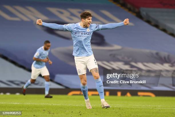 John Stones of Manchester City celebrates after scoring their sides third goal during the Premier League match between Manchester City and Crystal...