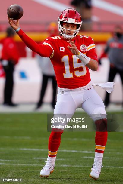 Quarterback Patrick Mahomes of the Kansas City Chiefs delivers a pass over the defense of the Cleveland Browns during the first quarter of the AFC...