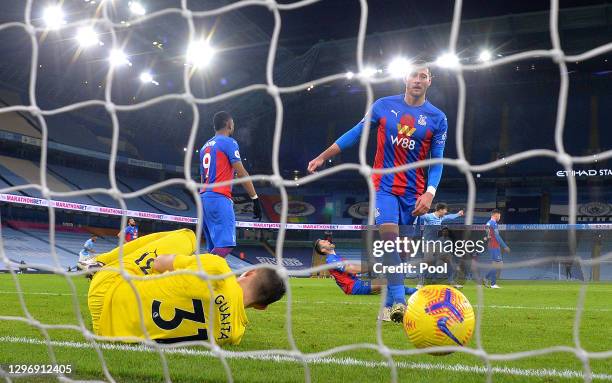 Joel Ward and Vicente Guaita of Crystal Palace look dejected after Manchester City's third goal scored by John Stones during the Premier League match...