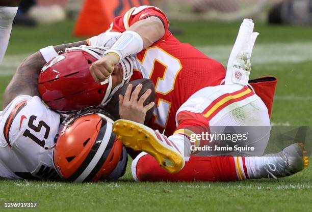 Quarterback Patrick Mahomes of the Kansas City Chiefs is sacked by outside linebacker Mack Wilson of the Cleveland Browns, Mahomes is injured on the...