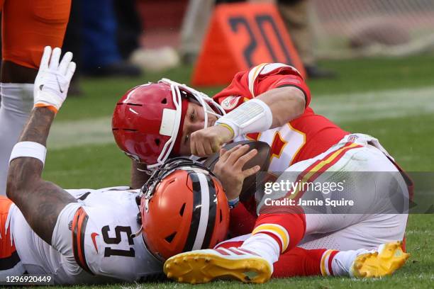 Quarterback Patrick Mahomes of the Kansas City Chiefs is sacked by outside linebacker Mack Wilson of the Cleveland Browns, Mahomes is injured on the...