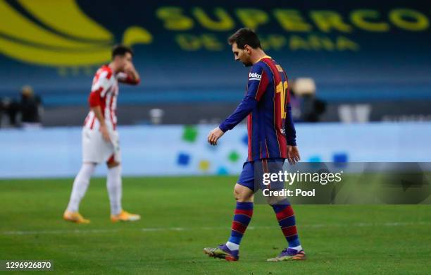 Lionel Messi of Barcelona walks off after being sent off during the Supercopa de Espana Final match between FC Barcelona and Athletic Club at Estadio...