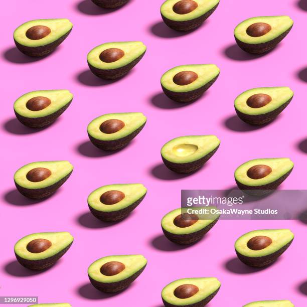 top view of avocado halves - colorful fruit stock pictures, royalty-free photos & images
