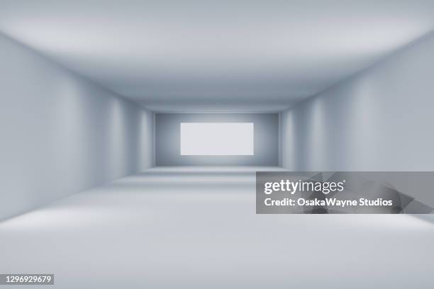 sparse white room with blank screen - tv show - fotografias e filmes do acervo