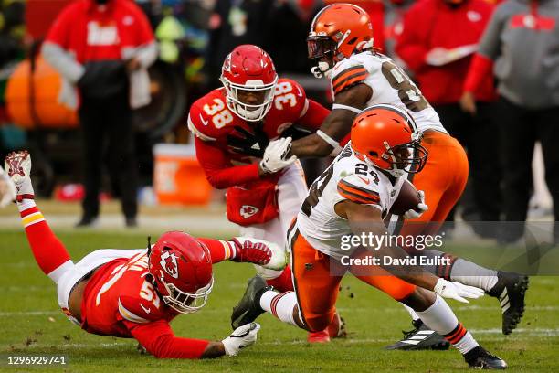 Running back Nick Chubb of the Cleveland Browns is tackled by defensive end Michael Danna of the Kansas City Chiefs during the third quarter of the...