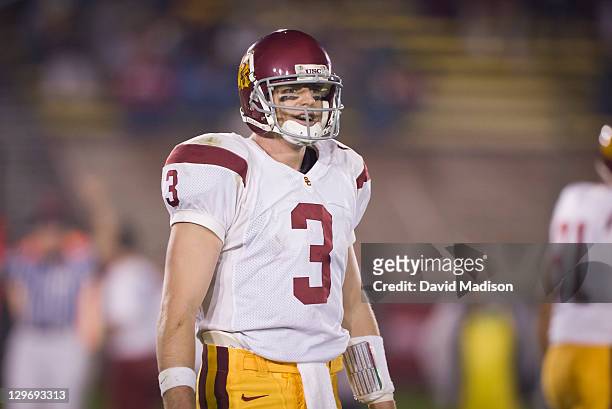 Carson Palmer of the USC Trojans looks to the sidelines during an NCAA football game against the Stanford University Cardinal on November 9, 2002 at...