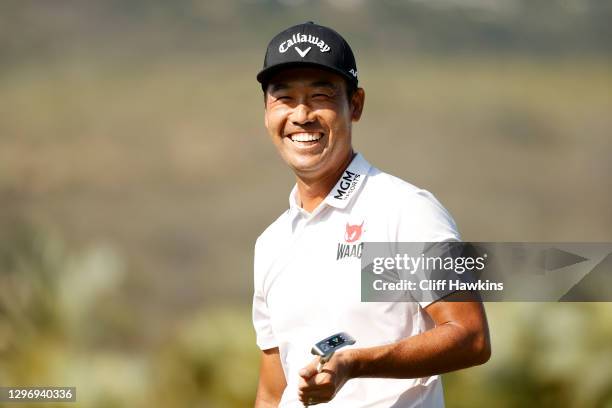 Kevin Na of the United States smiles after winning on the 18th hole during the final round of the Sony Open in Hawaii at the Waialae Country Club on...