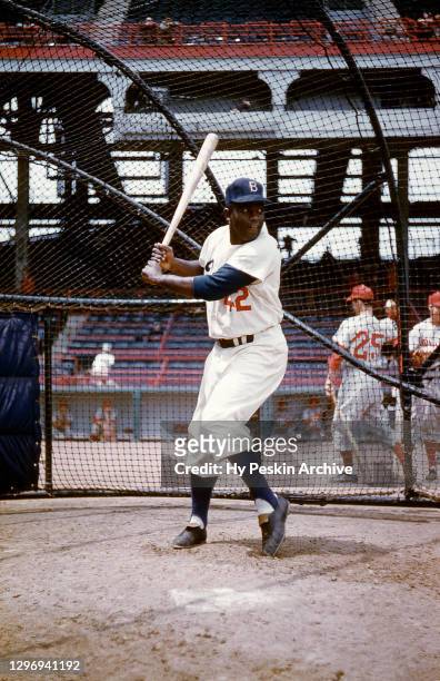 Jackie Robinson of the Brooklyn Dodgers takes batting practice prior to an MLB game against the Philadelphia Phillies on May 22, 1955 at Ebbets Field...
