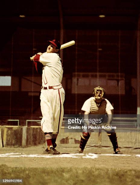 Stan Musial of the St. Louis Cardinals swings during batting practice prior to an MLB Spring Training game circa March, 1958 in St. Petersburg,...