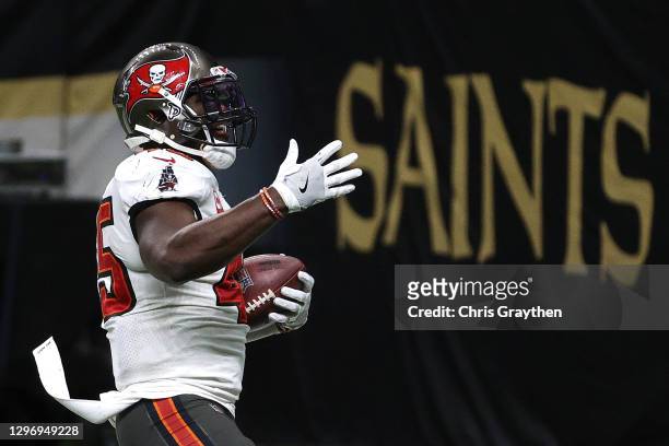 Devin White of the Tampa Bay Buccaneers celebrates after intercepting a pass thrown by Drew Brees of the New Orleans Saints during the fourth quarter...