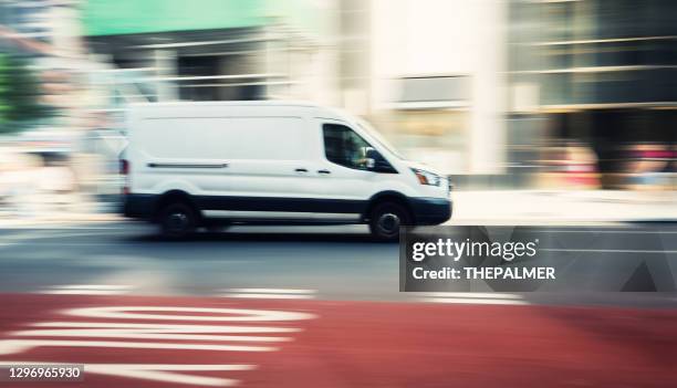 commercial white van speeding in new york - van stock pictures, royalty-free photos & images