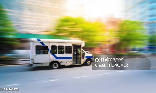 shuttle passenger bus in manhattan, new york - shuttle stock pictures, royalty-free photos & images