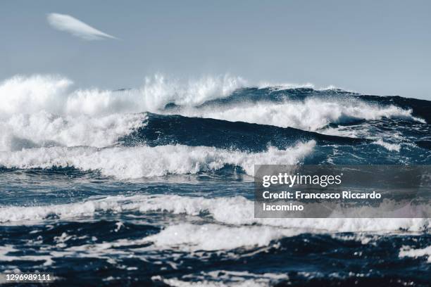 waves and rough blue ocean sea, fuerteventura - tide foto e immagini stock