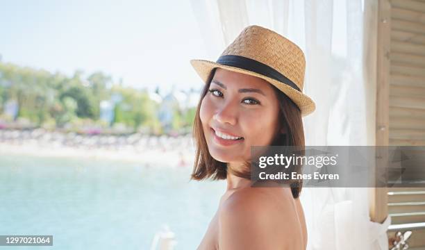 holiday at tourist resort in summer - coconut beach woman stock pictures, royalty-free photos & images