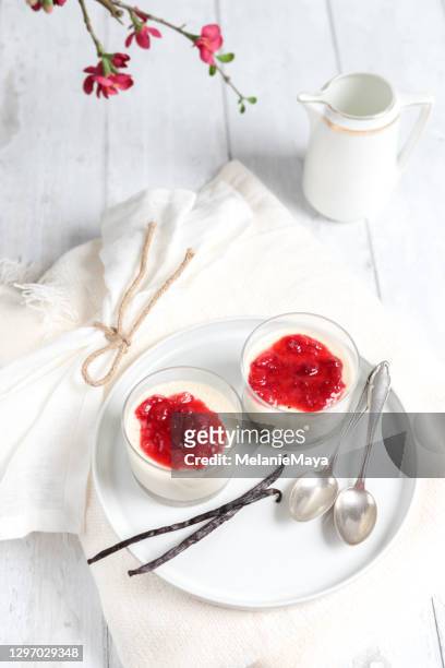 homemade strawberry panna cotta dessert with vanilla and strawberry sauce - panna cotta stock pictures, royalty-free photos & images