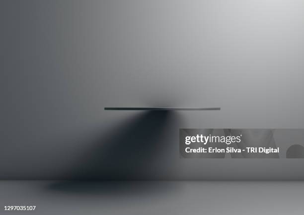 abstract light and shadow design on gray tones background - empty shelves stock pictures, royalty-free photos & images