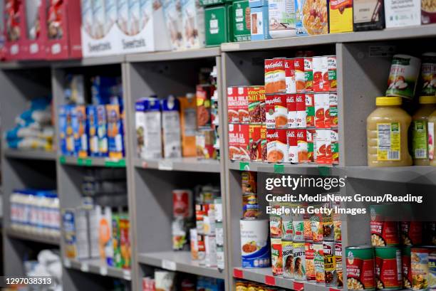 Reading, PA Non-perishable food items on the shelf at the food pantry. At Opportunity House in Reading Friday morning January 15, 2021 to unveil a...