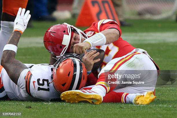 Quarterback Patrick Mahomes of the Kansas City Chiefs is sacked by outside linebacker Mack Wilson of the Cleveland Browns, Mahomes is injured on the...