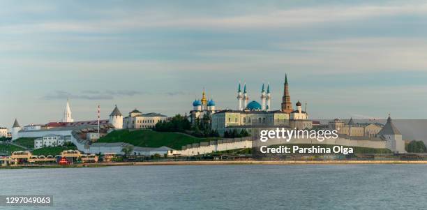 panoramic view on kazan kremlin from other side of volga river - tatarstan stock pictures, royalty-free photos & images