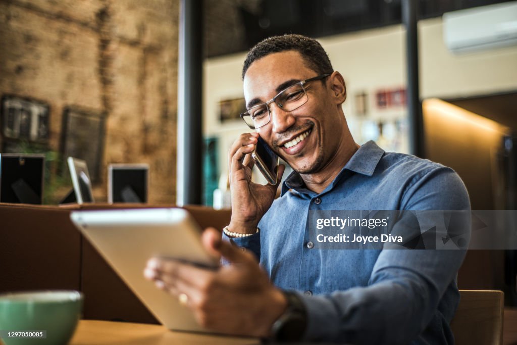 Young businessman using a digital tablet in a modern office