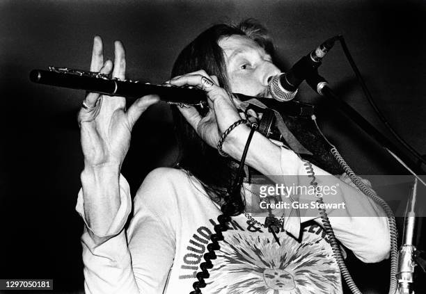Dave Brock of Hawkwind performs on stage at Bracknell Leisure Centre, Berks, England, in 1977.