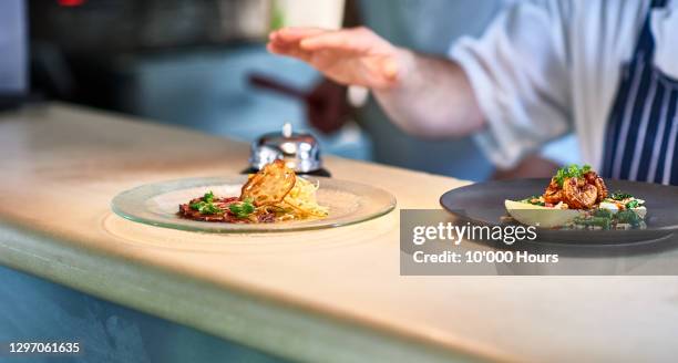 close up of food on restaurant service counter - campana fotografías e imágenes de stock