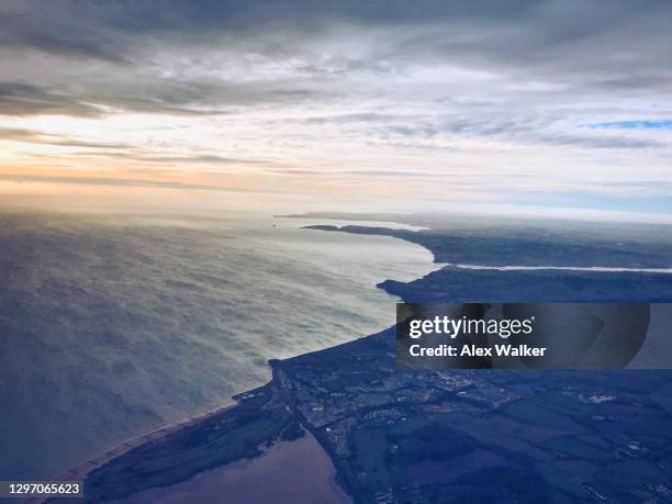 aerial view of rural coastal landscape on a windy day - baie de studland photos et images de collection