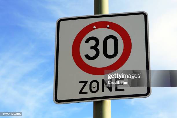 street sign "zone 30 km/h" (berlin, germany) - speed limit sign stock pictures, royalty-free photos & images