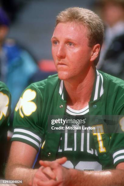 Larry Bird of the Boston Celtics looks on during a NBA basketball game against the Washington Bullets at the Capital Centre on January 12, 1991 in...