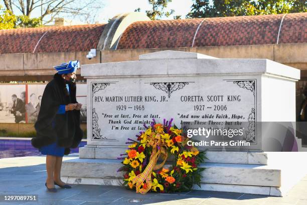 Christine King Farris is seen laying a wreath on the grave of Dr. Martin Luther King during the 2021 King Holiday Observance Beloved Community...