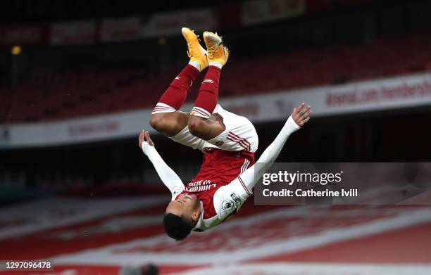 Pierre-Emerick Aubameyang of Arsenal celebrates after scoring their team's first goal during the Premier League match between Arsenal and Newcastle...
