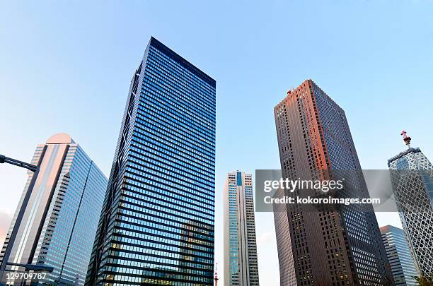 shinjuku skyscrapers - オフィスビル ストックフォトと画像