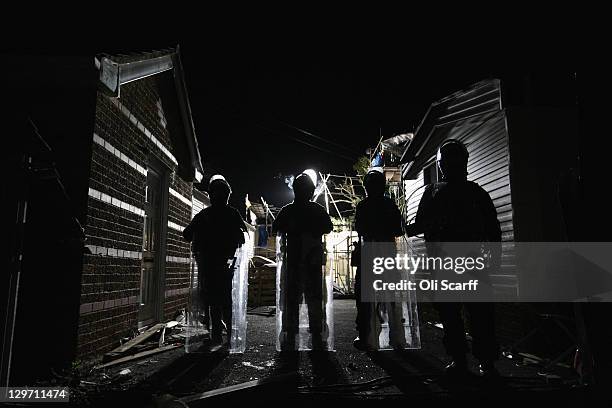 Police officers guard the main barricade during the eviction of Dale Farm travellers camp on October 20, 2011 near Basildon, England. Travellers have...