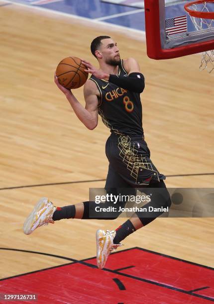 Zach LaVine of the Chicago Bulls goes up for a dunk against the Houston Rockets at the United Center on January 18, 2021 in Chicago, Illinois. NOTE...