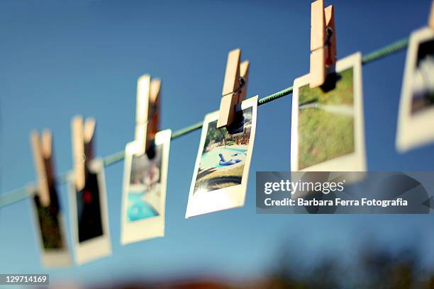 summer memories - hanging photos stock pictures, royalty-free photos & images