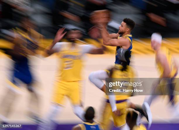 Stephen Curry of the Golden State Warriors drives to the basket to score a layup during a 115-113 Warriors win over the Los Angeles Lakers on Martin...