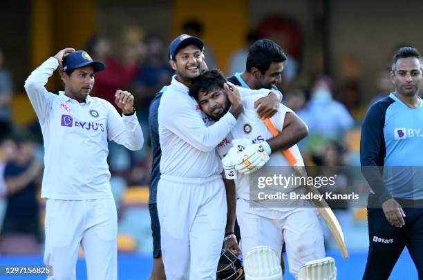 Rishabh Pant of India celebrates victory with his team mates after day five of the 4th Test Match in the series between Australia and India at The...