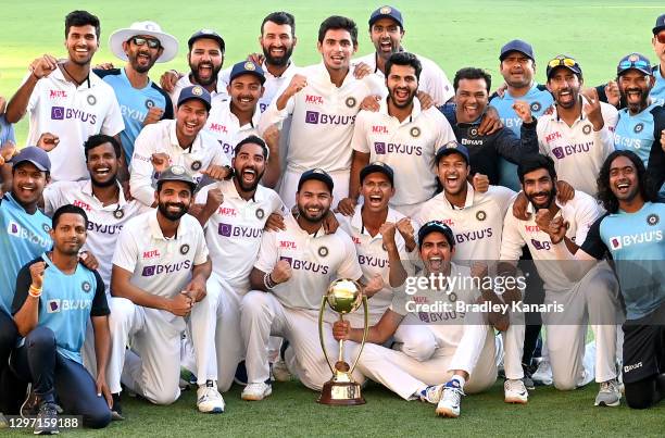 The Indian team celebrates victory after day five of the 4th Test Match in the series between Australia and India at The Gabba on January 19, 2021 in...