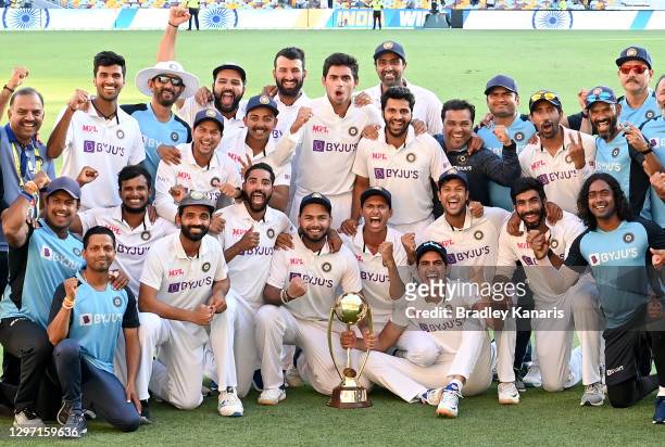 The Indian team celebrates victory after day five of the 4th Test Match in the series between Australia and India at The Gabba on January 19, 2021 in...