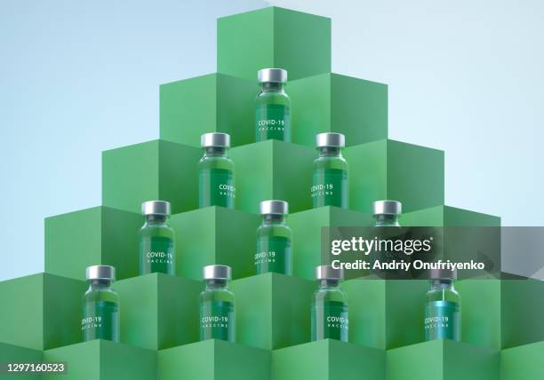 covid-19 vaccine bottles pyramid. - 3d pyramid stock pictures, royalty-free photos & images