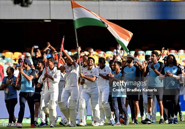 The Indian team celebrates victory after day five of the 4th Test Match in the series between Australia and India at The Gabba on January 19, 2021 in...