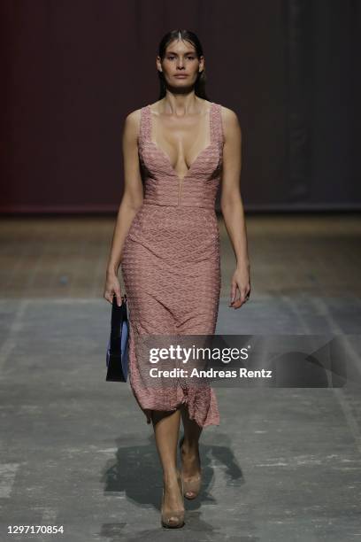 In this image released on January 19, A model walks the runway at the Lana Mueller show during the Mercedes-Benz Fashion Week Berlin January 2021 at...