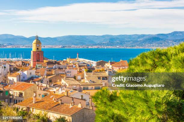 overview of the city of saint tropez with its singular bell tower, côte d'azur, france - st tropez photos et images de collection