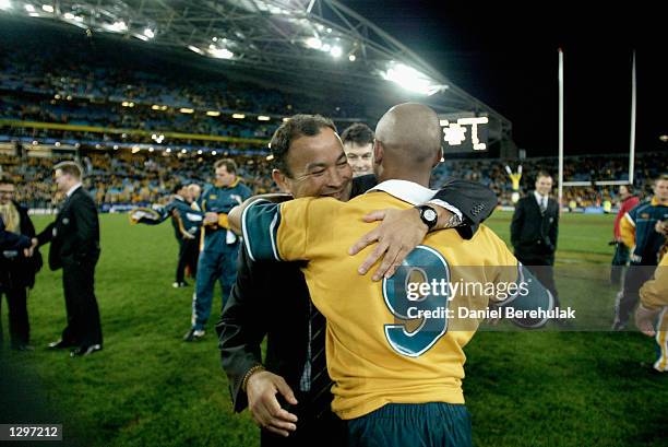 Eddie Jones, the Wallabies coach celebrates with George Gregan, the Wallabies captain after winning the Tri Nations Rugby Union test match between...