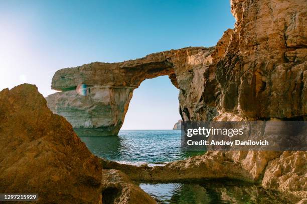 azure window in sunset. gozo island, malta. - gozo malta stock pictures, royalty-free photos & images