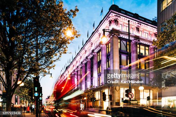 a night-time view of oxford street in london - stock photo - oxford street stock pictures, royalty-free photos & images